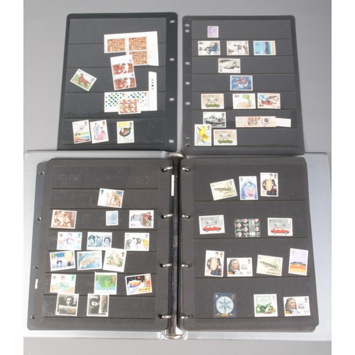 496 - An album of mint/unused British stamps. Includes GPO Definitive Issue Low and High Value presentatio... 