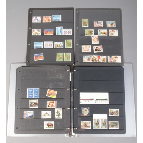 496 - An album of mint/unused British stamps. Includes GPO Definitive Issue Low and High Value presentatio... 