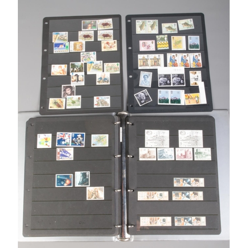 496 - An album of mint/unused British stamps. Includes GPO Definitive Issue Low and High Value presentatio... 