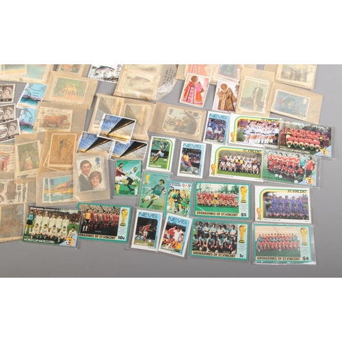 512 - A large collection of loose stamps. Mainly British commemorative examples, includes St Vincent Mexic... 