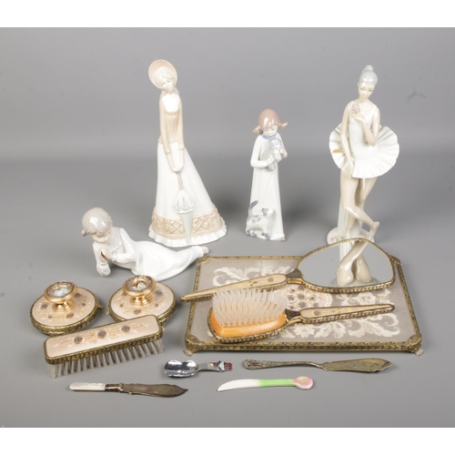 516 - A quantity of decorative items to include several lace inset dressing table set, Casades porcelain f... 