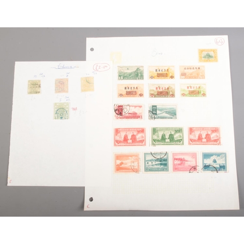 520 - A collection of Chinese stamps. Includes One Candarin green dragon stamp.