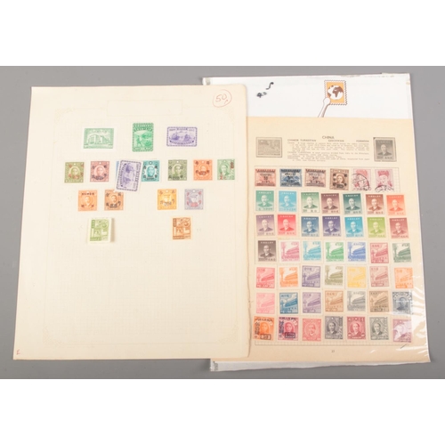 520 - A collection of Chinese stamps. Includes One Candarin green dragon stamp.