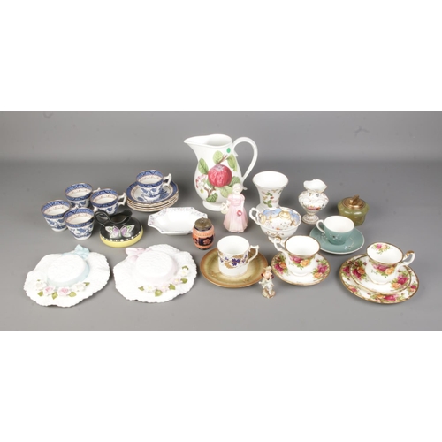 521 - A collection of assorted ceramics to include 19th Century Royal Crown Derby coffee mug, Shelley, Roy... 