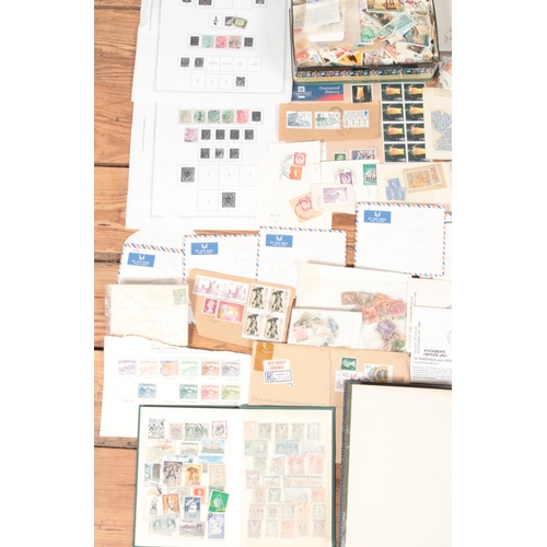 547 - A large collection of British and world stamps. Includes PHQ cards, commemorative and first day cove... 