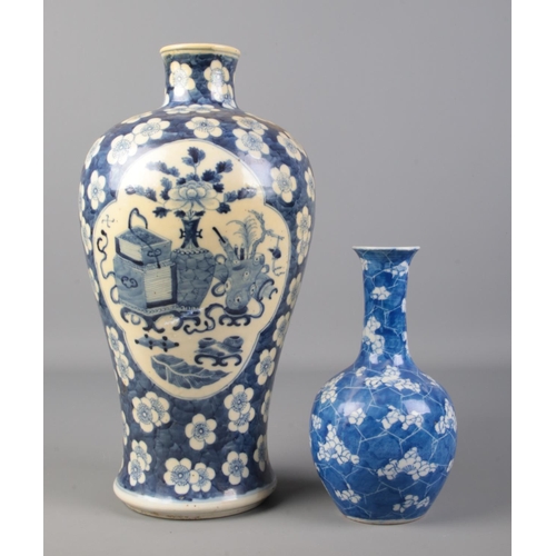 551 - Two Chinese blue and white vases. The larger having four character mark to base. Height of tallest 3... 