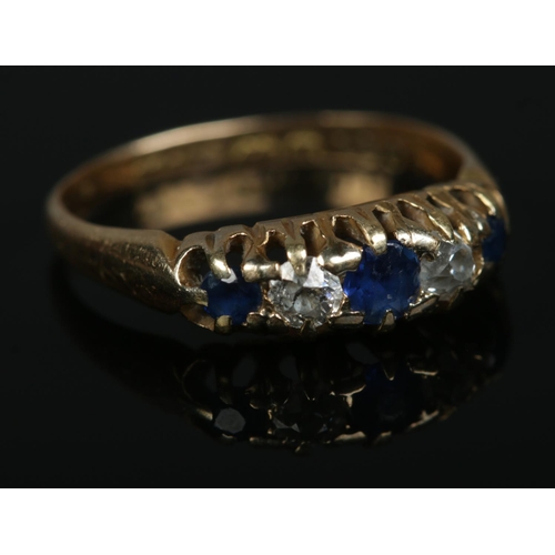 573 - An 18ct gold sapphire and diamond five stone ring.

2.53g
Size K1/2