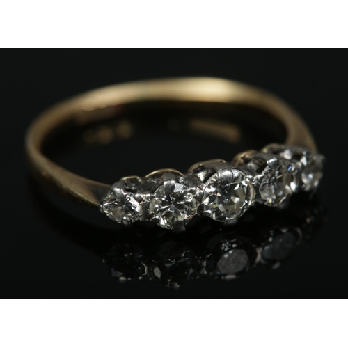 575 - An 18ct gold five stone diamond ring 

1.74g
J1/2