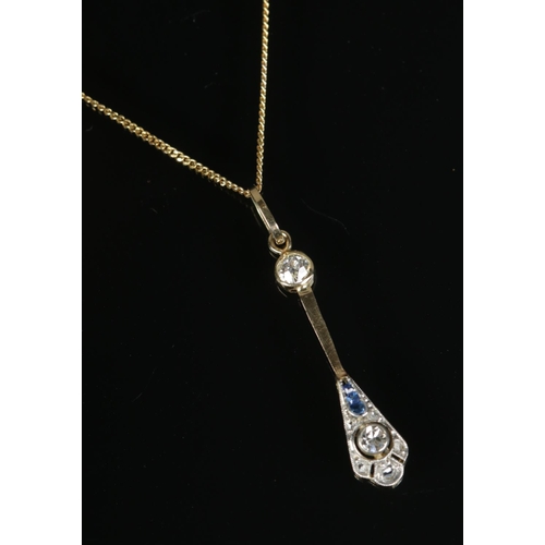 595 - An 18ct sapphire and diamond pendant on 9ct gold chain

1.63g