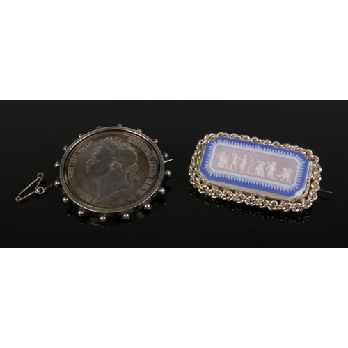 601 - A George IV crown brooch 1821 and a Wedgwood silver brooch.