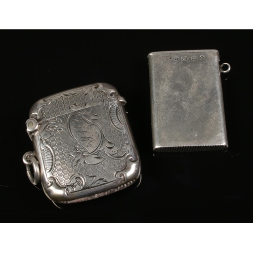 603 - Two Victorian silver vesta cases.

Total weight 35.04