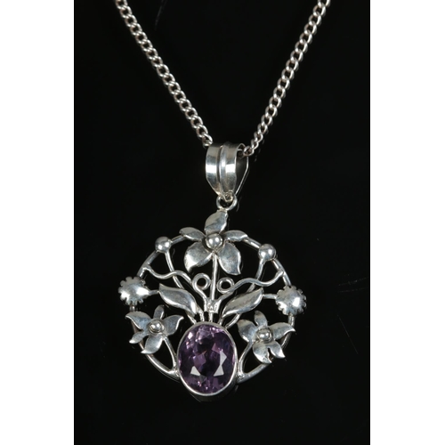 608 - A silver amethyst flower pendant on chain.

12.39g