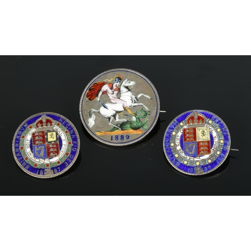 612 - Three Victorian enamelled coin brooches.