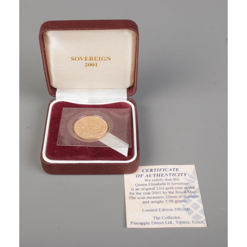 621 - A Royal Mint limited edition cased Queen Elizabeth II full sovereign dated for 2001.