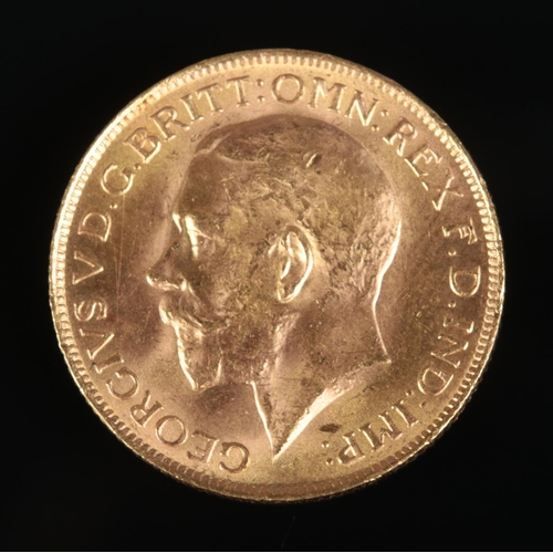 623 - A George V full sovereign. Dated 1925. 7.9g.