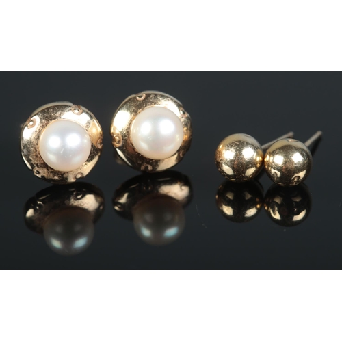 644 - Two pairs of 9ct gold earrings one pair set with pearls