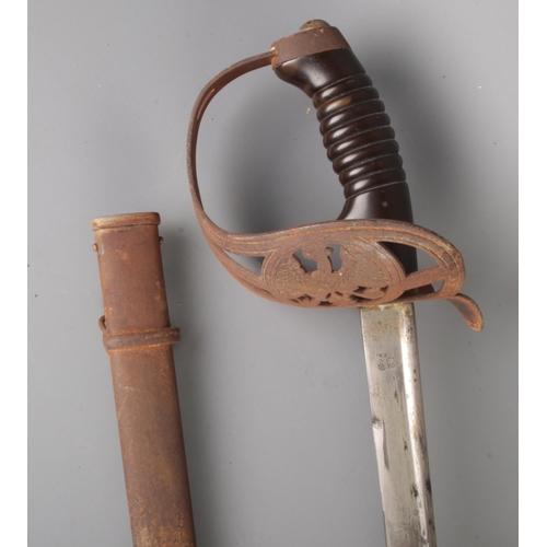 117 - A German/Prussian 1889 cavalry sword with scabbard. Stamped WK&C to blade for Weyersberg, Kirschbaum... 