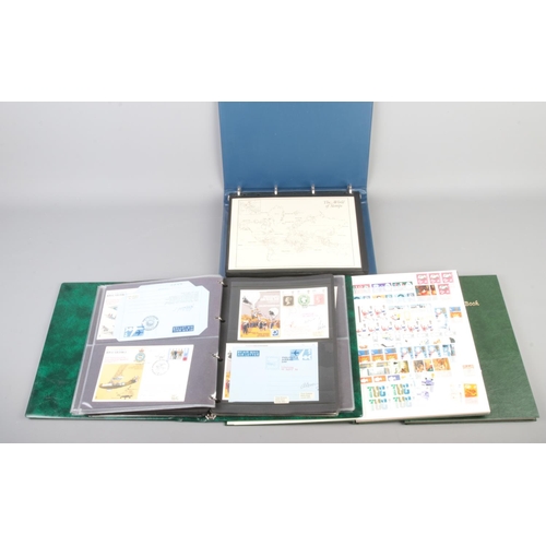 152 - A collection of albums with one containing limited edition signed RAF first day covers, one stock bo... 