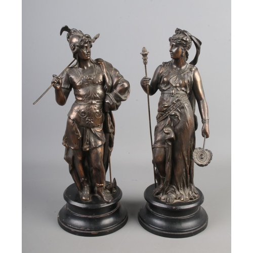 162 - A pair of spelter figures, modelled as a Grecian lady and warrior. Height 35cm.