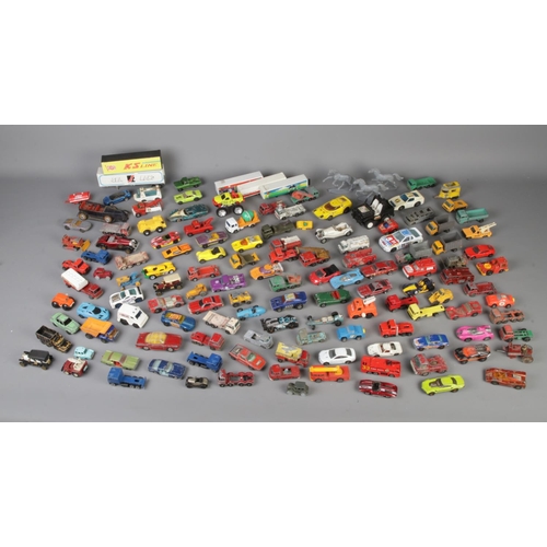 165 - A large collection of vintage diecast vehicles including matchbox, corgi, etc