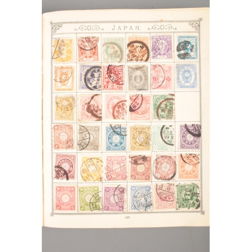 169 - Three partly filled world stamp albums, together with a small collection of loose examples.