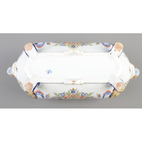 173 - A 19th century Italian faience centrepiece bowl with acanthus decorated handles and feet