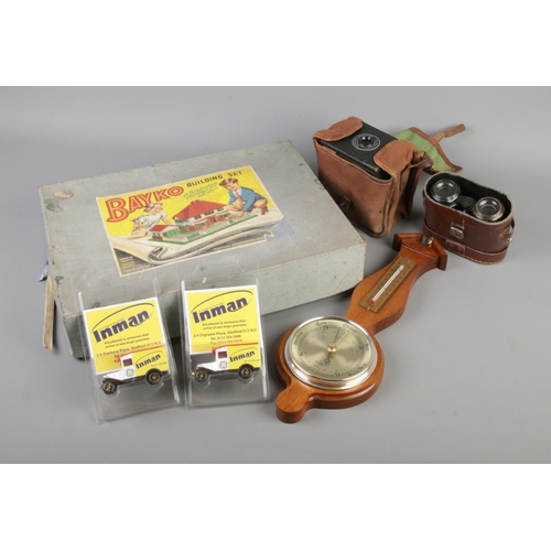 190 - A group of collectables. Includes Bayko Building Set No. 2, barometer, Brownie Box Camera, cased Fre... 