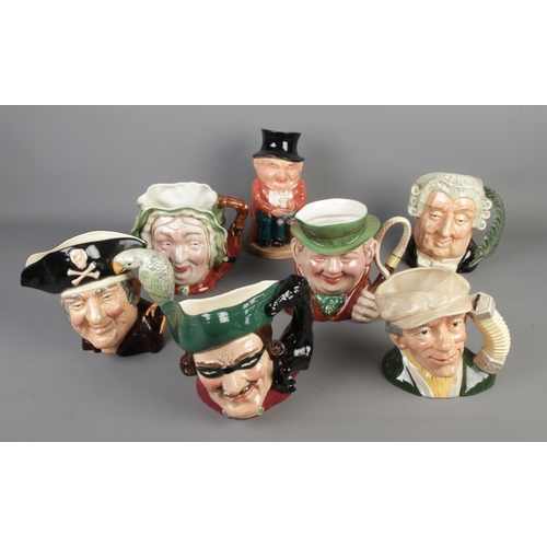 196 - A collection of four Royal Doulton Character jugs including, The Lawyer, The Busker, Dick Turpin and... 