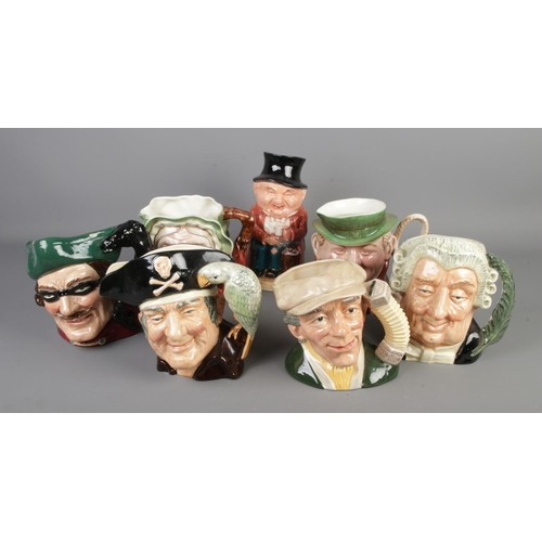 196 - A collection of four Royal Doulton Character jugs including, The Lawyer, The Busker, Dick Turpin and... 