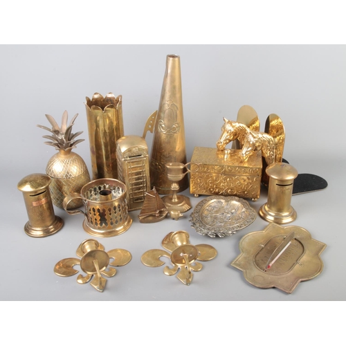 20 - A collection of brassware to include trench art Army Ordnance Corps vase, telephone box, candlestick... 