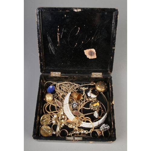 225 - A lacquered box containing an assortment of jewellery and collectables. To include Villard ball cloc... 