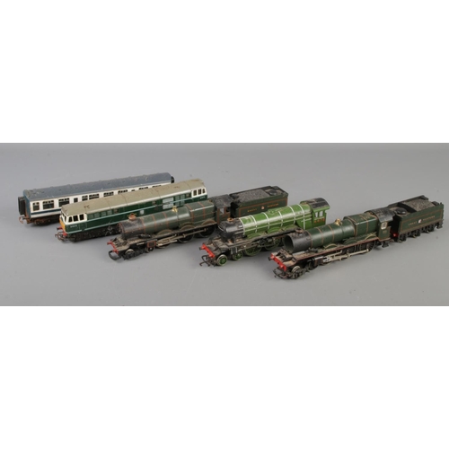 242 - A collection of OO gauge model railway locomotives, tender and carriages. Includes Hornby, Lima and ... 