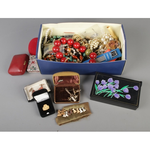 244 - A box of assorted costume jewellery to include Cunard pin badge, beaded necklaces, Sophos cufflinks,... 