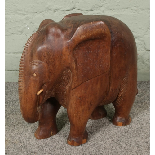 246 - A large carved wooden elephant ornament, height 37 x width 38cm