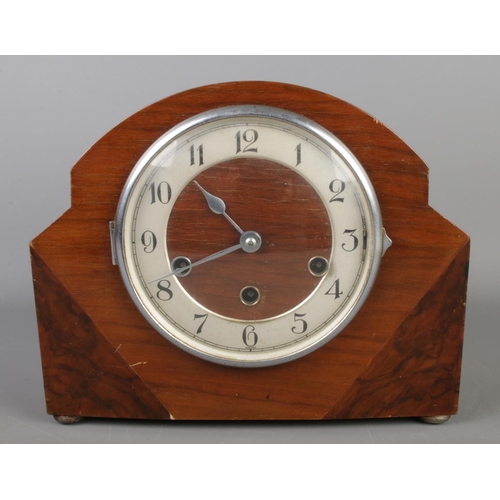 254 - A mahogany and walnut Westminster chime mantel clock with Haller movement.