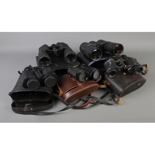 259 - Five pair of binoculars. Includes Prismex, Stem, USSR example etc.