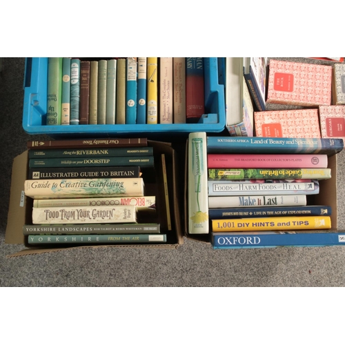 262 - Four boxes of assorted mostly non-fiction books to include travel guides, ordinance survey maps, Ill... 