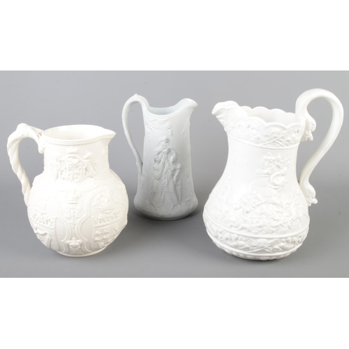 32 - A Parian ware jug, marked W.B for William Brownfield, COBRIDGE ALBION together with two similar exam... 