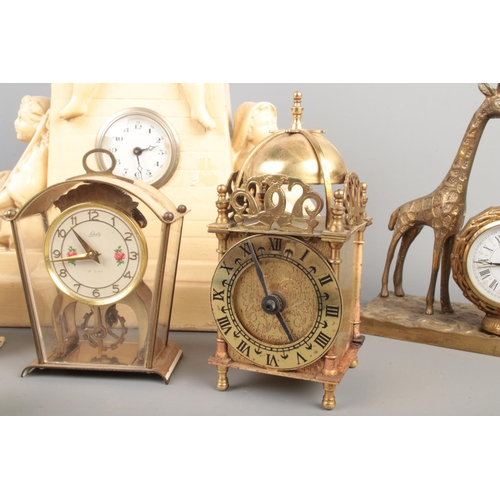 337 - Collection of vintage and modern clocks, including Smith battery powered brass lantern clock, German... 