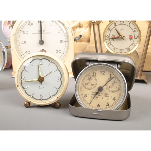 337 - Collection of vintage and modern clocks, including Smith battery powered brass lantern clock, German... 