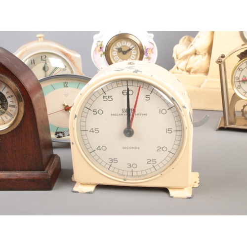 337 - Collection of vintage and modern clocks, including Smith battery powered brass lantern clock, German... 