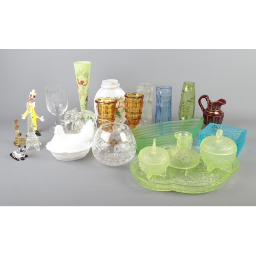 33 - A collection of assorted art glass to include Edinburgh crystal bowl, vases, uranium glass butterfly... 