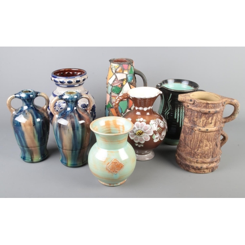 38 - A collection of vintage ceramics including West German Pottery, Belgium Pottery, Lake's Cornish Pott... 