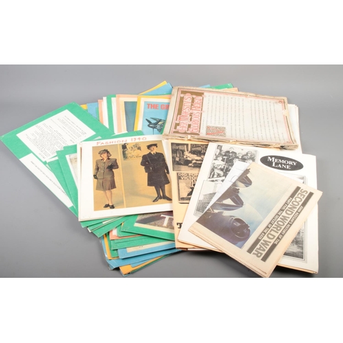 404 - A mixed collection of vintage World War II teacher's printed aids, including 21 military posters (le... 