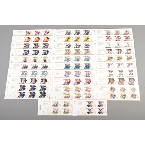 5 - The Royal Mail; a large collection of London 2012 Team GB Gold Medal Winners mint stamps on sheets. ... 