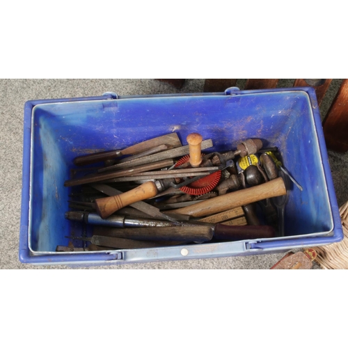 430 - A box and a basket of vintage hand tools along with five spirit levels. Includes plane, measures, br... 