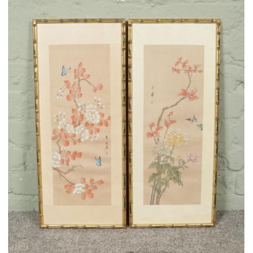 470 - Two gilt framed Chinese silk watercolour panels, depicting Prunus trees surrounded by butterflies. H... 