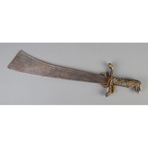 576 - A vintage brass handled machete engraved with the crocodile registered mark for Martindale, brass ha... 