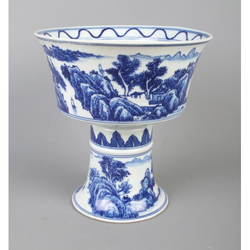 577 - A Chinese blue and white stem cup with reign marks to base