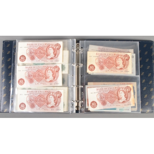 593 - A folder containing a large collection of mainly Bank of England bank notes, including uncirculated ... 